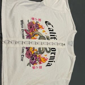 White Graphic Tee with Floral and Snake Design